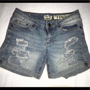 Distressed denim shorts